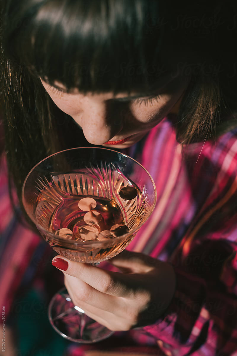 A woman drinks Rose wine