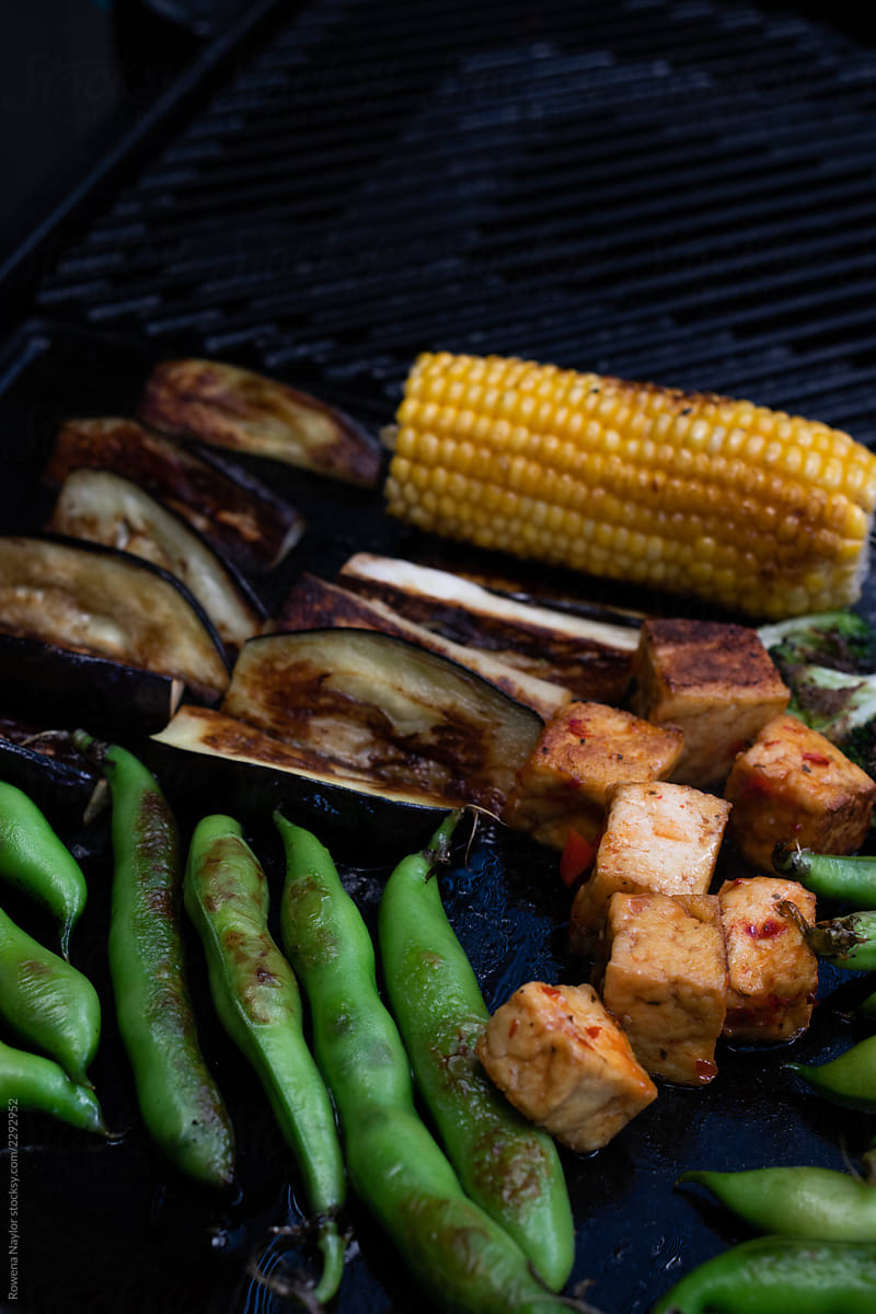 Vegetarian/Vegan BBQ foods on grill plate being cooked