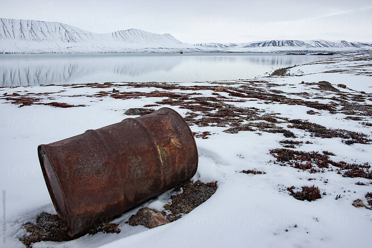 Oil Drum Awash on Arctic Shores