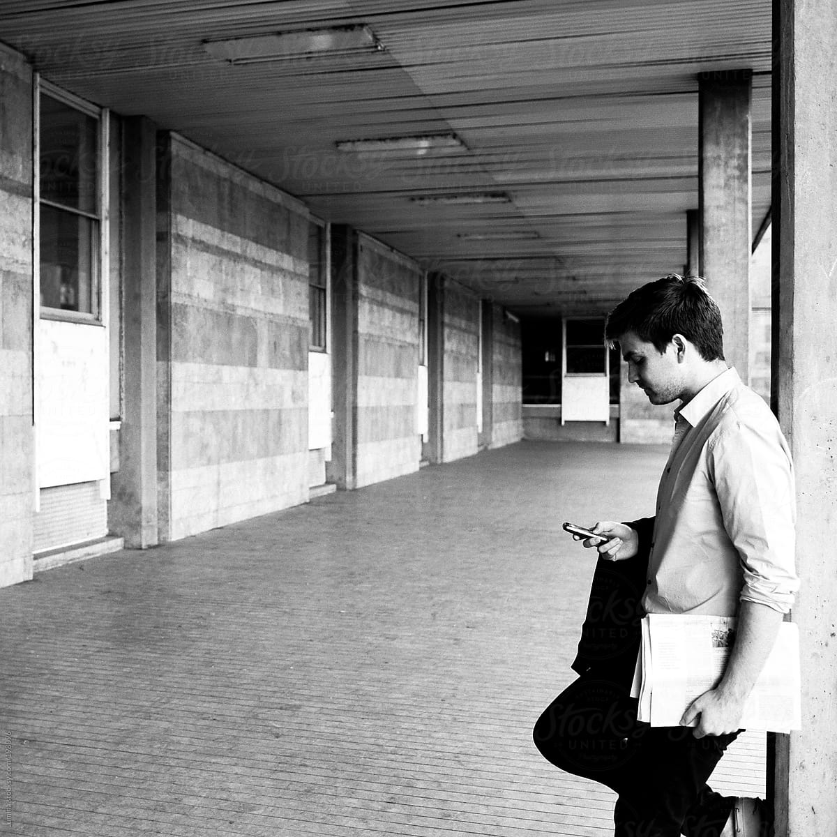 Man Texting on the Street