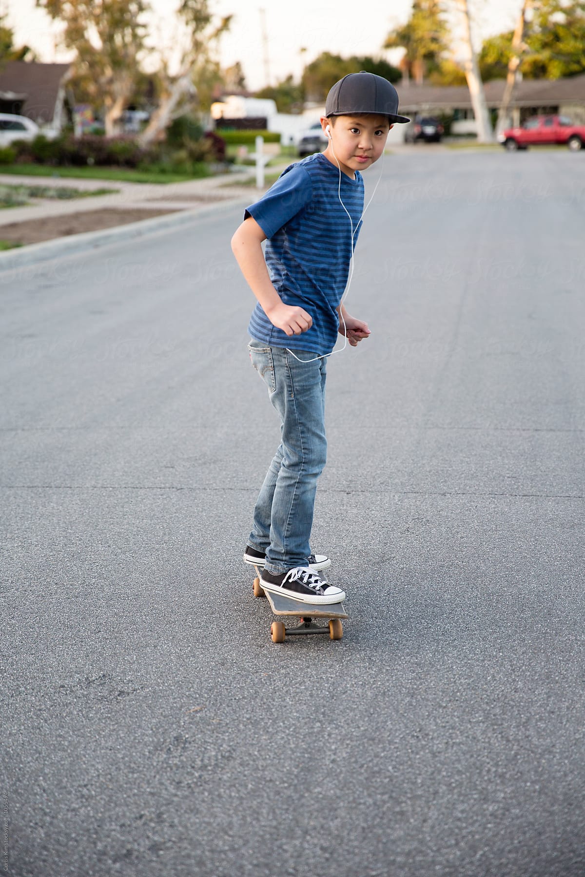 Cruising on his skateboard