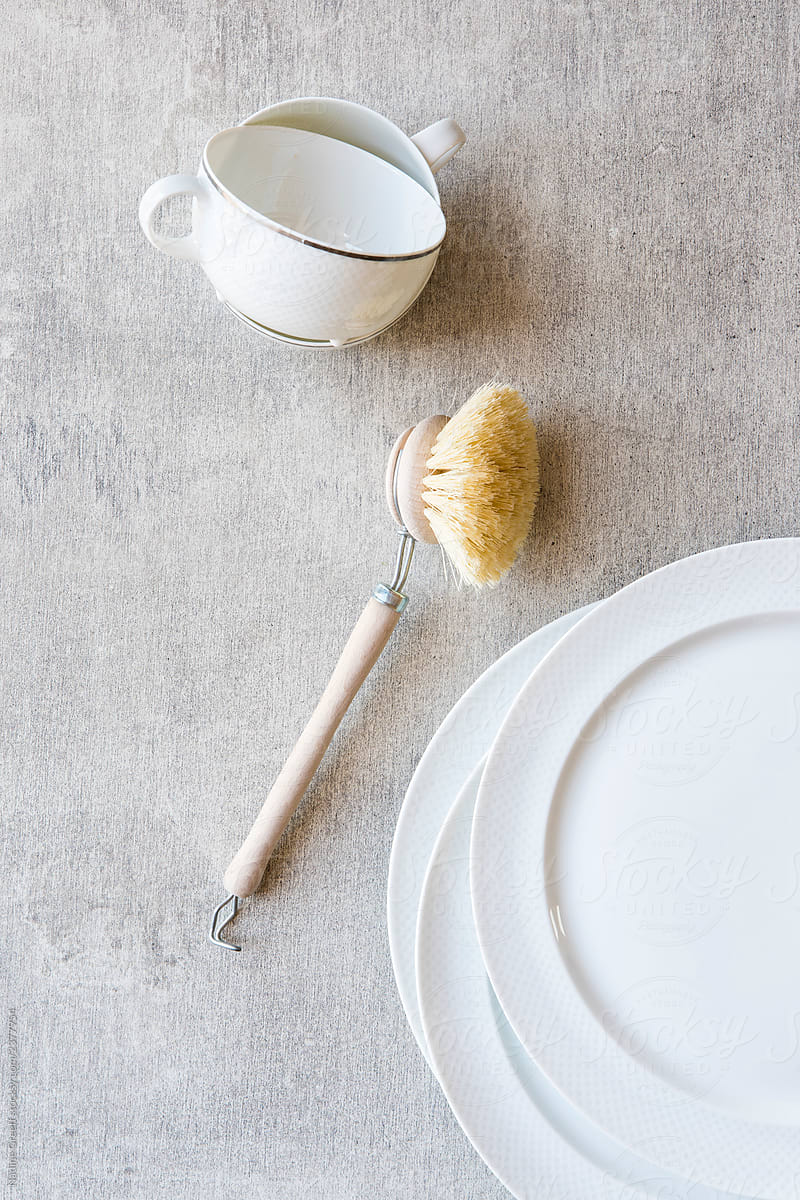Crockery and cleaning brush