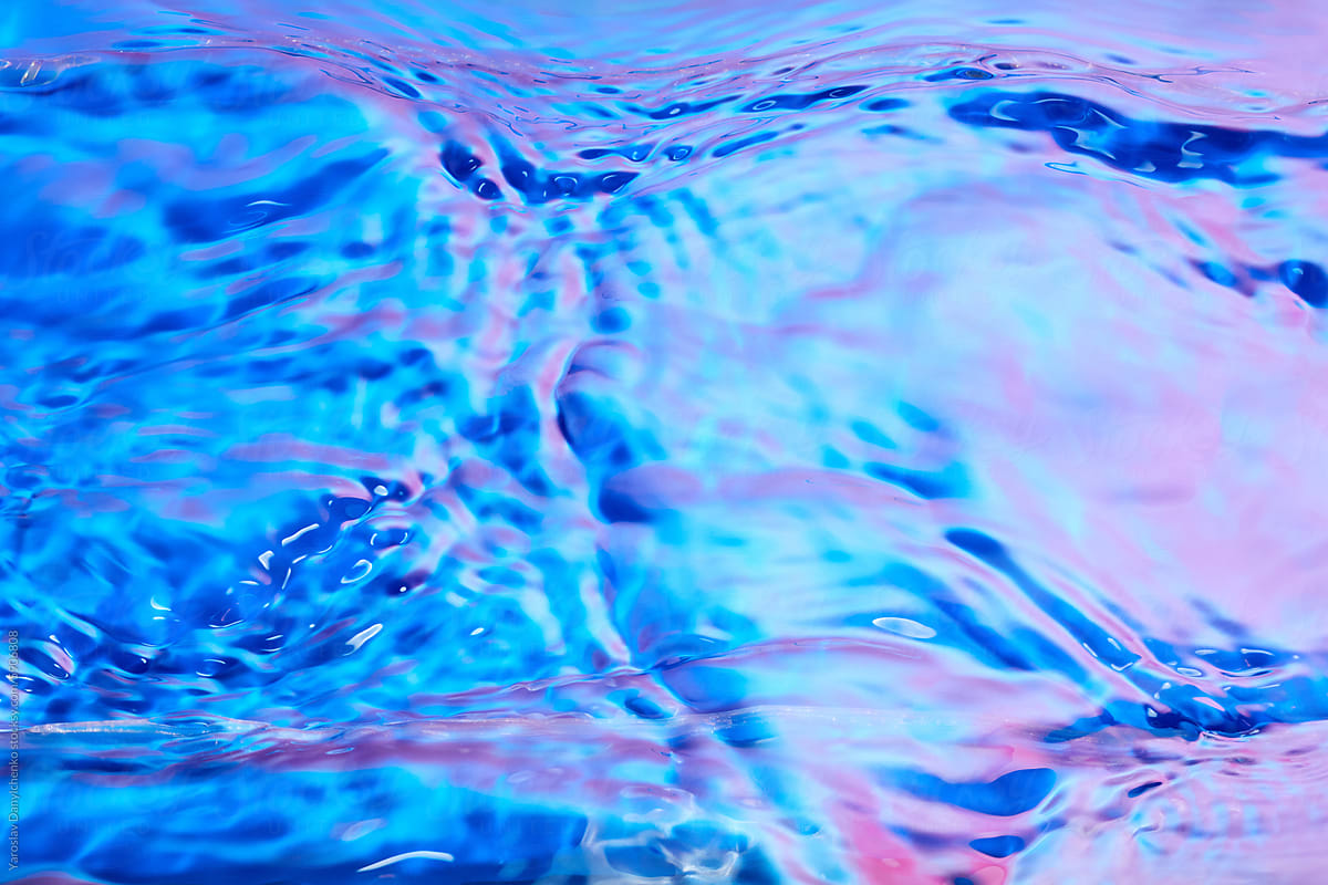 Blue and violet color ripples on water surface.
