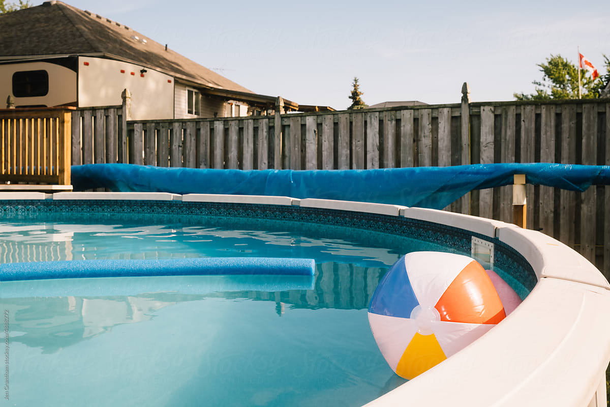 Beach ball floating in the pool