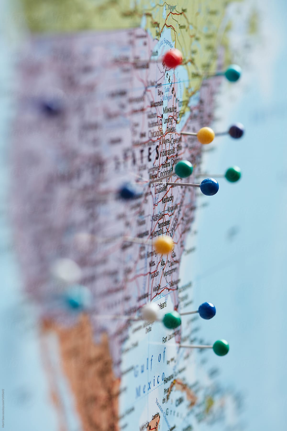 North America marked with colorful push pins.