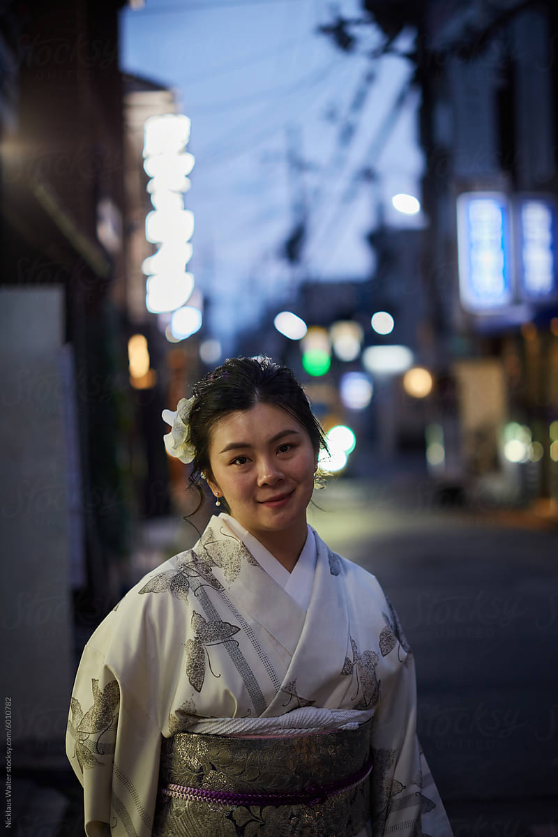 Happy Asian Woman Wearing A Kimono In Kyoto, Japan.