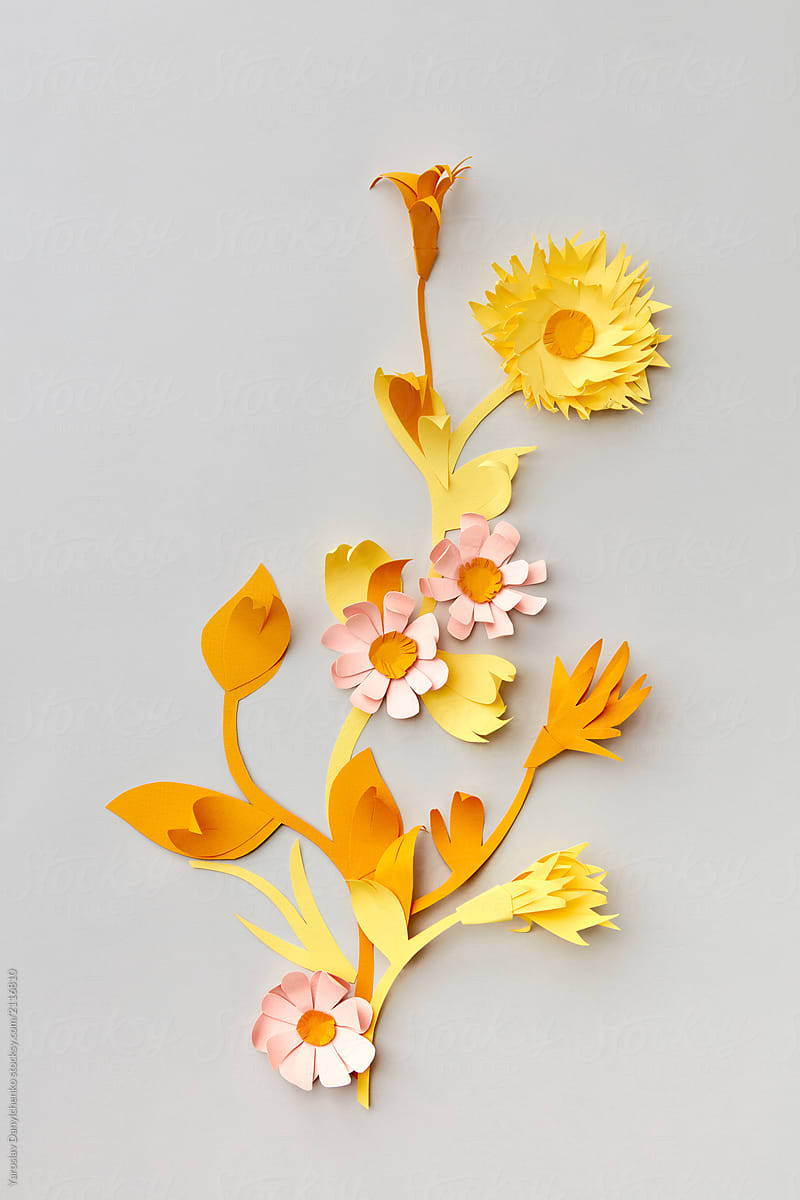 Summer yellow wildflowers handmade of colofrul paper on a light