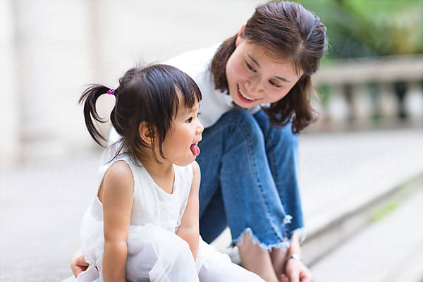 Lovely Chinese Toddler Girl In White Skirt by Stocksy Contributor Bo Bo  - Stocksy