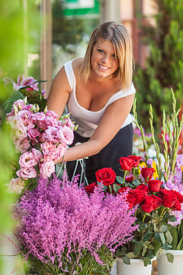 Professional Florist Girl Collecting Flowers by Stocksy