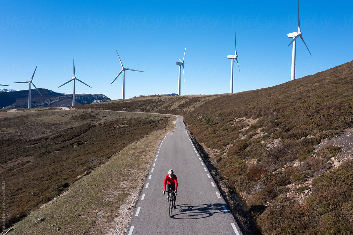 Bicycle ride under a wind farm