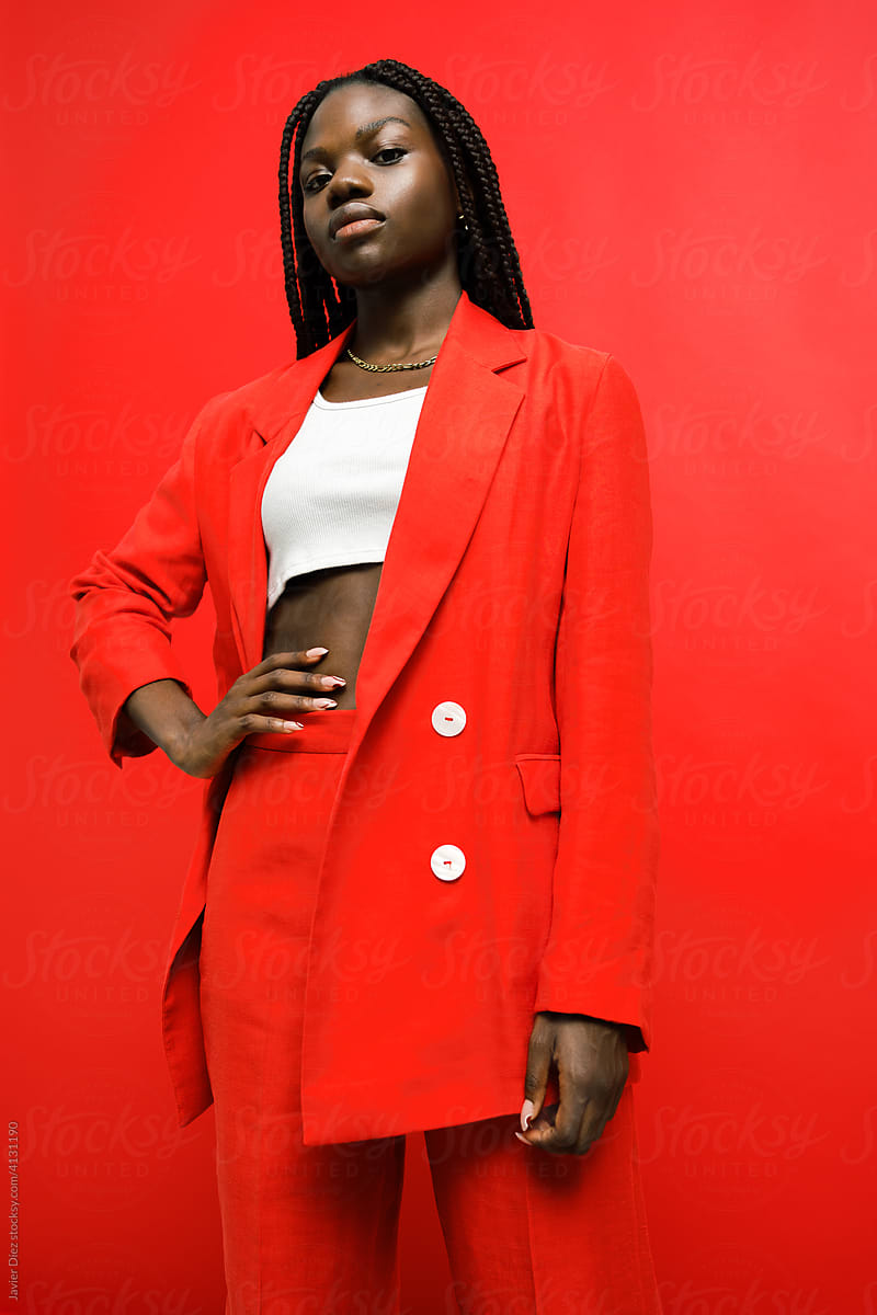Black woman in classy red suit