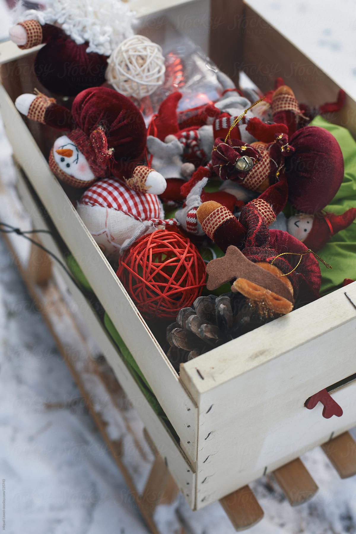Sled loaded with christmas ornaments