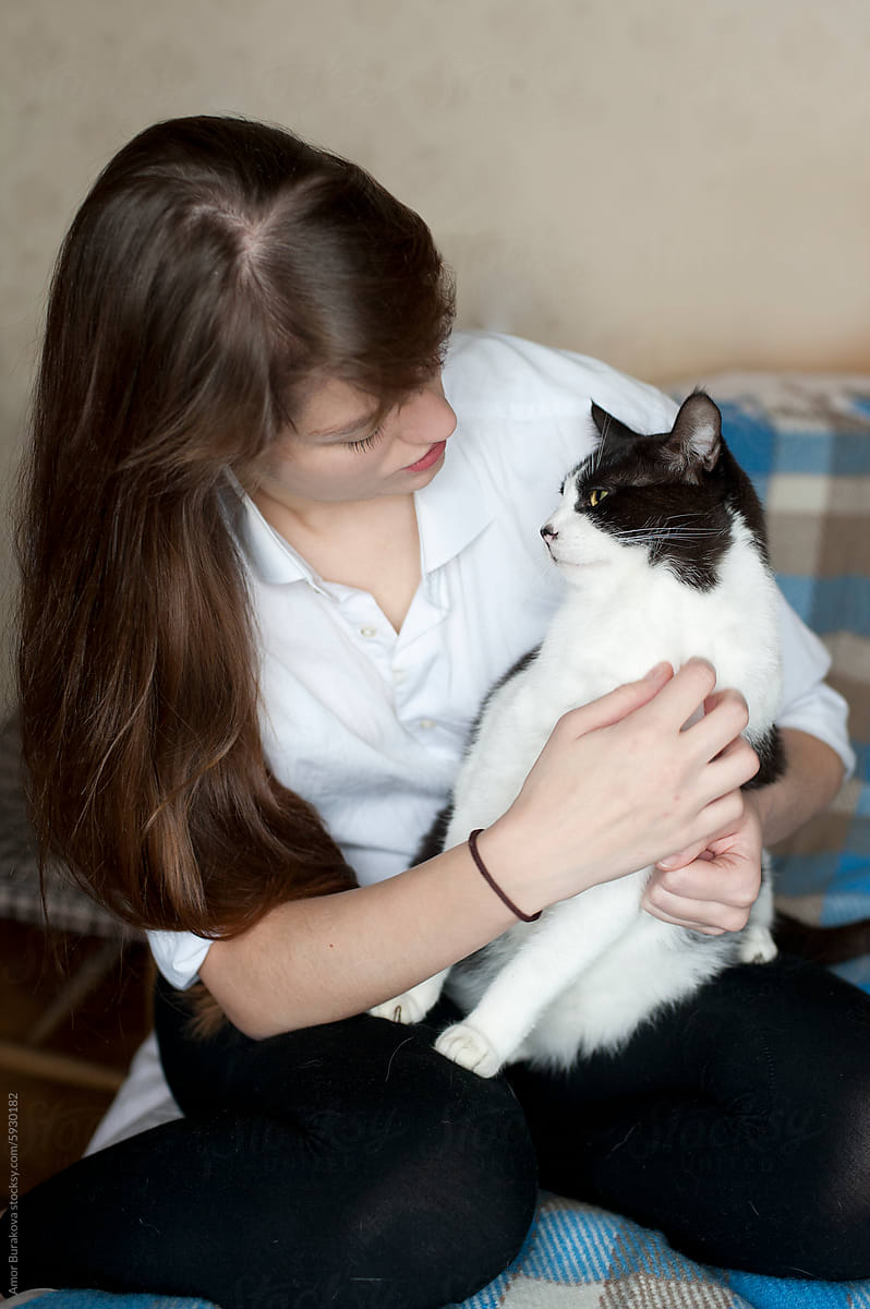 Woman speaking with her cat