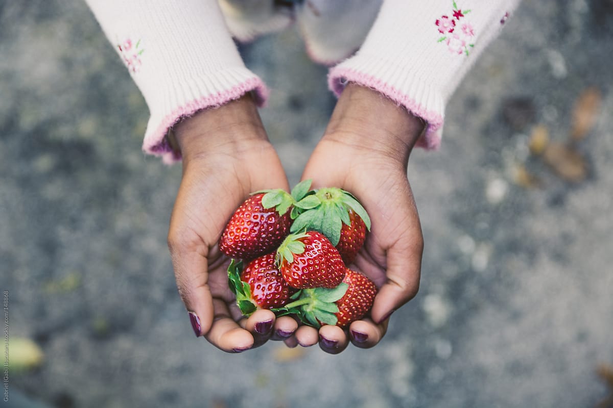 Hands With Strawberries