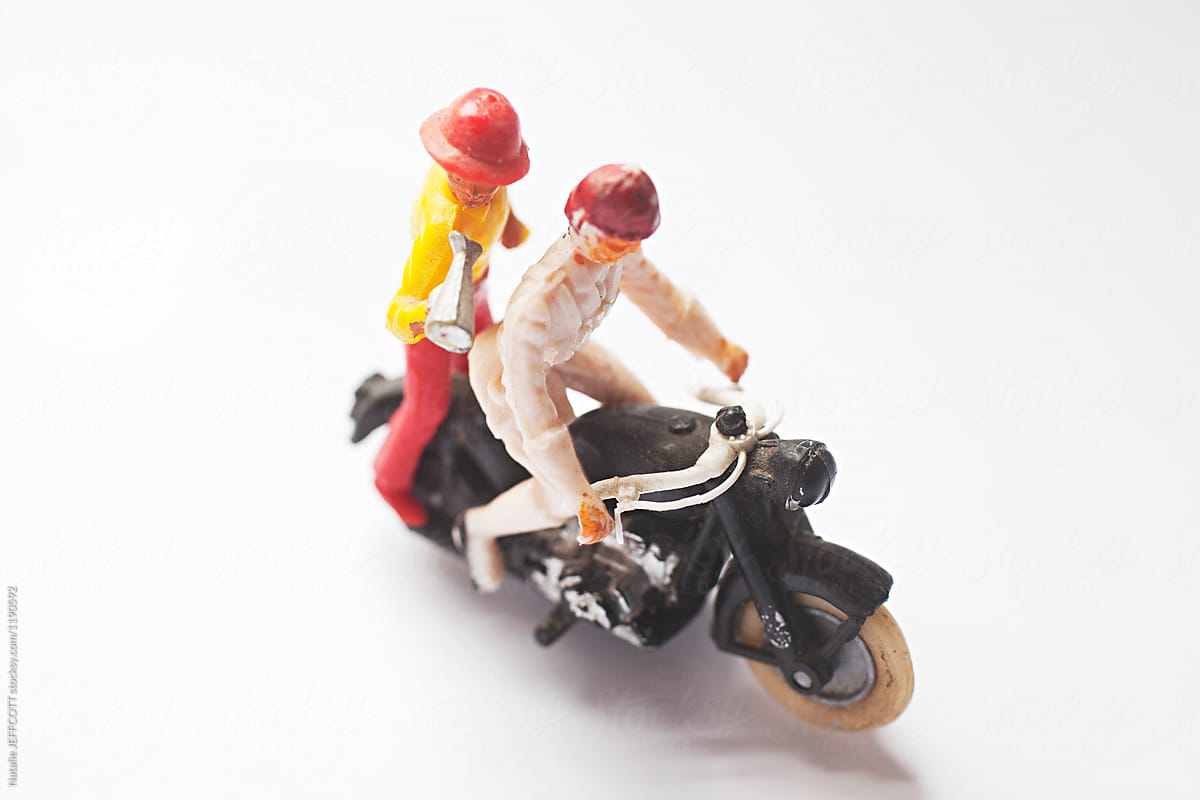 Old, Vintage tin toys - riding a motorbike / scooter