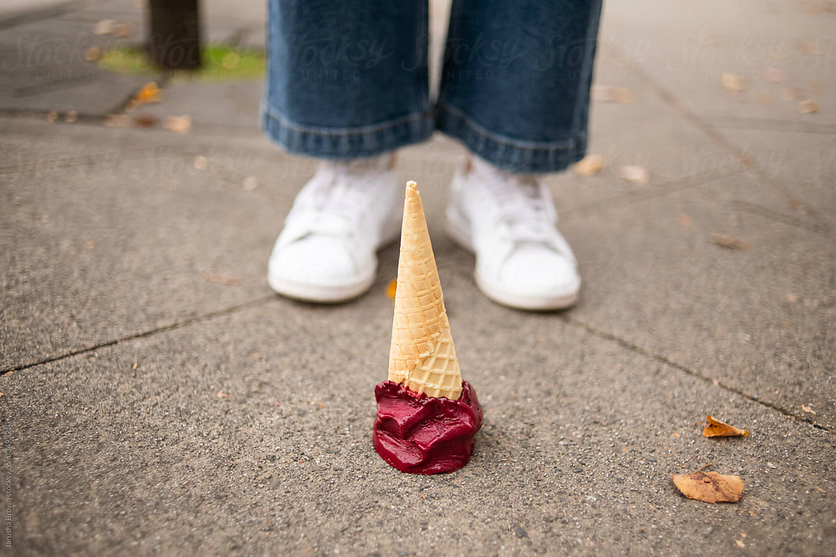Waffle cone with gelato on sidewalk