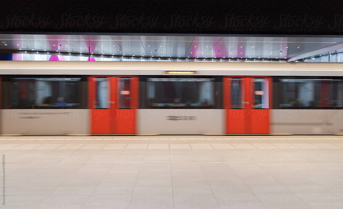 metro departing from platform