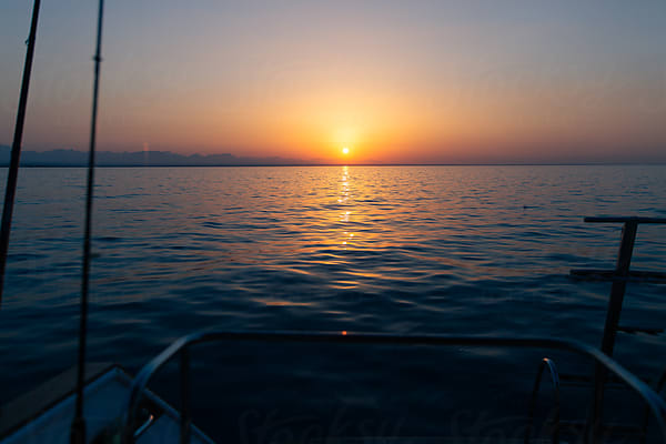 Couple Fishing On The Red Sea by Stocksy Contributor Shannon