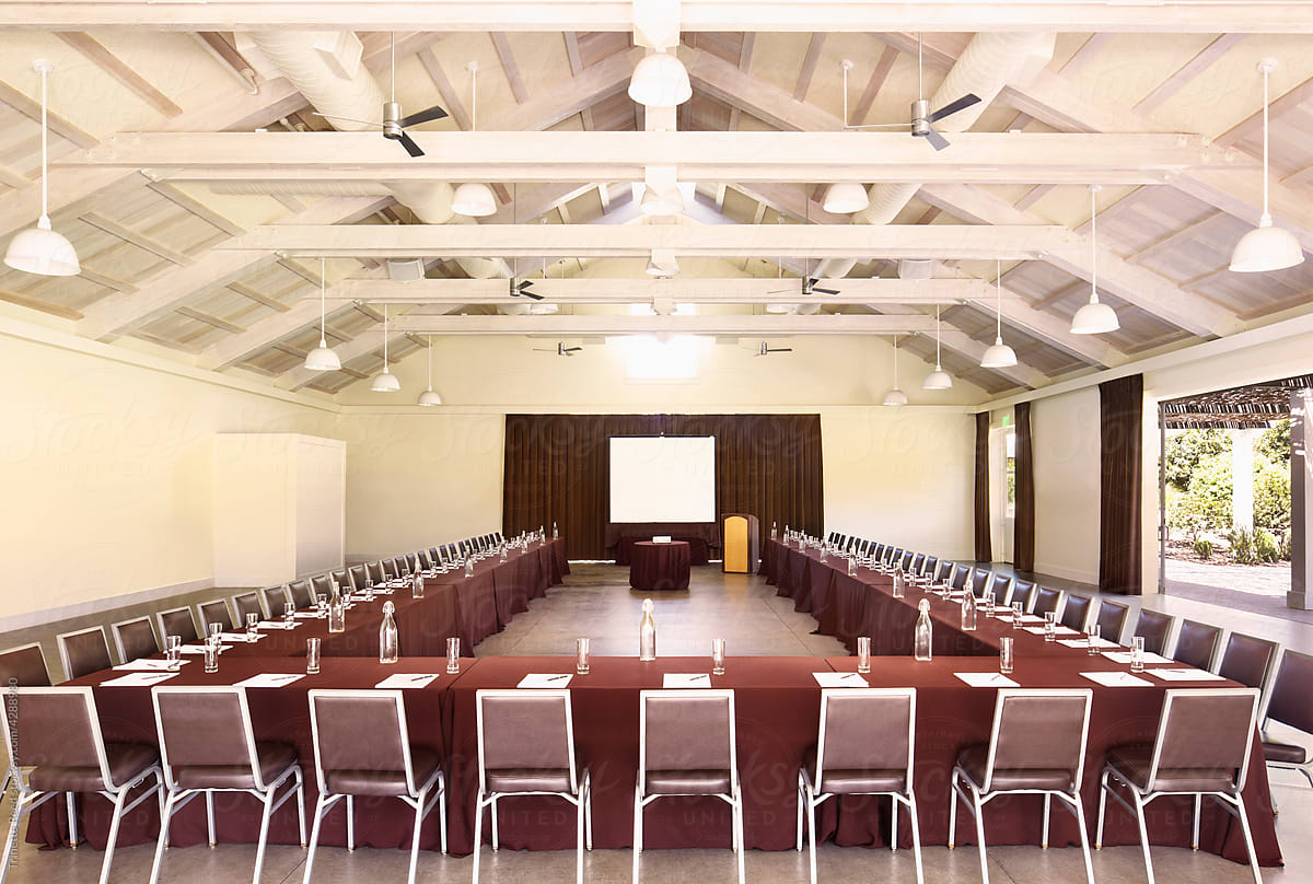 Large business conference room event space with screen
