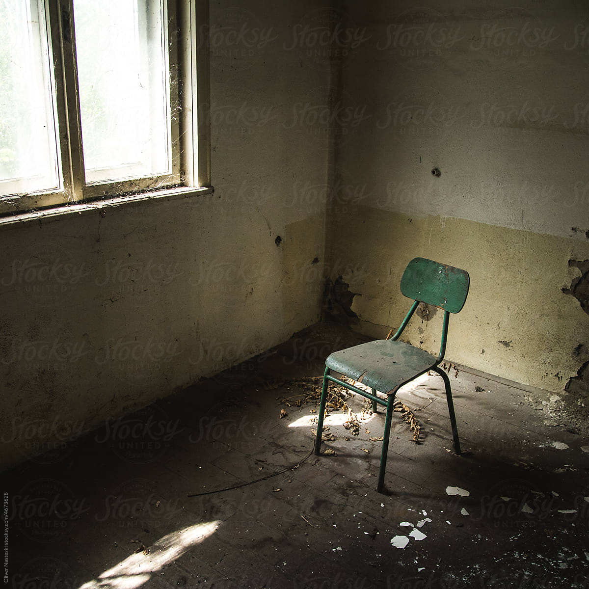 Abandoned Room With a Chair