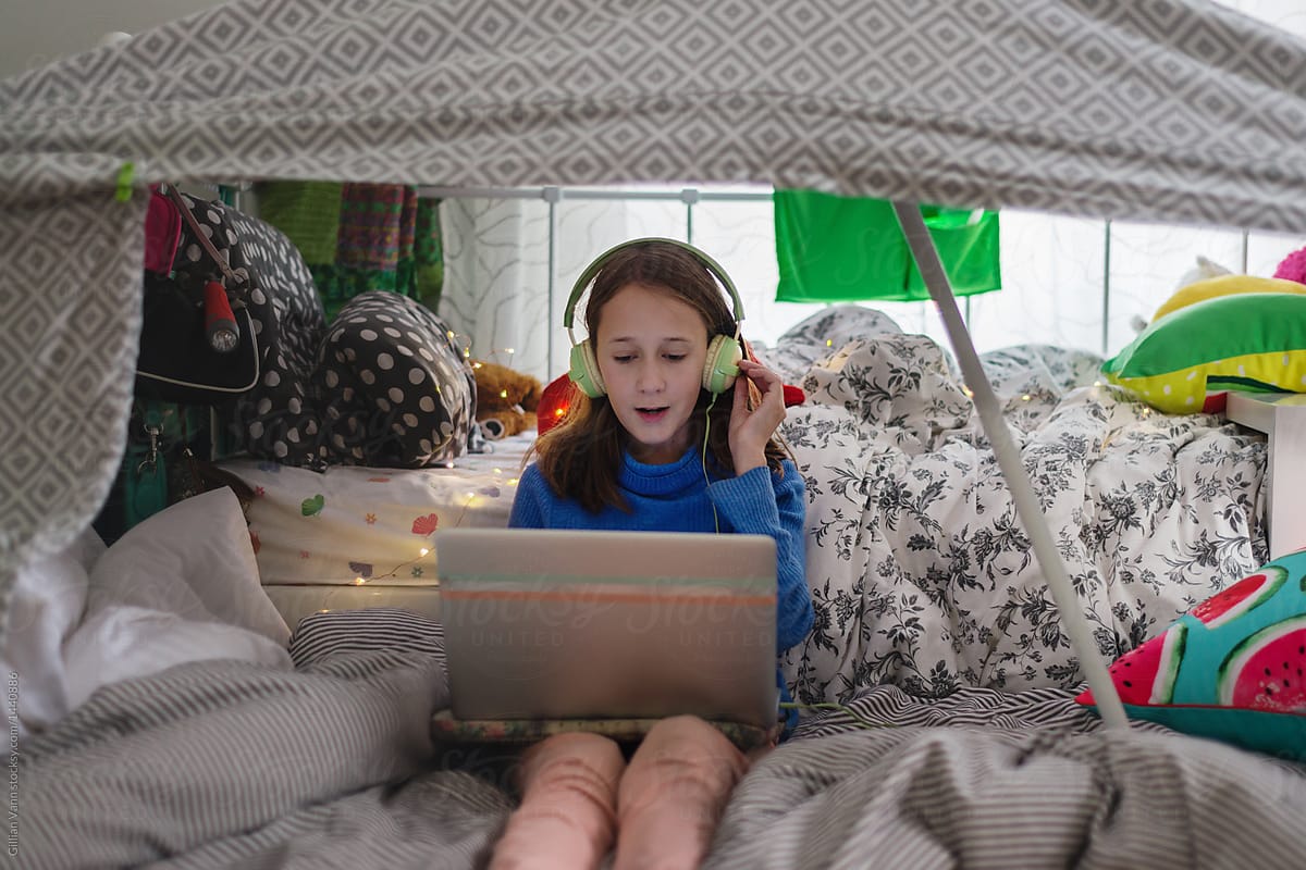 Tween Girl In Her Room Under A Cubby House Listening To Music By 