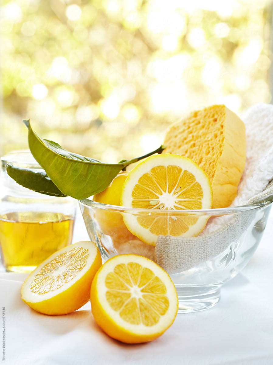 Natural homemade cleaning products with fresh lemon