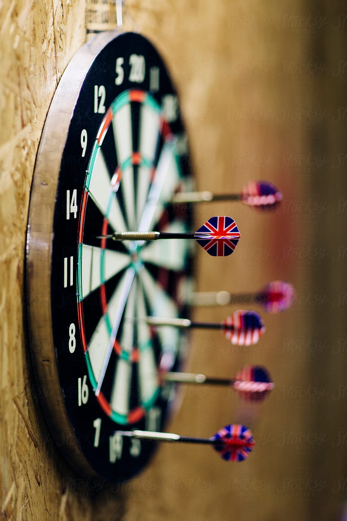 Dart Board With English Union Jack and American Flags in pub bar