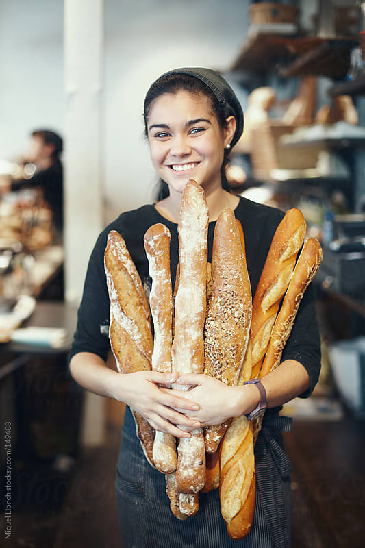 Saleswoman holding bread