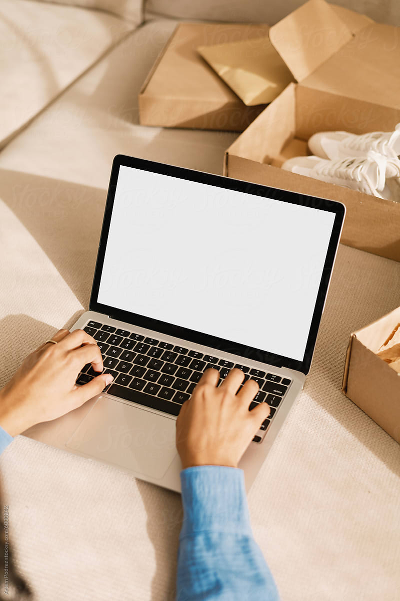 Mockup Laptop with white screen E-commerce Lifecycle: From Box to Blog