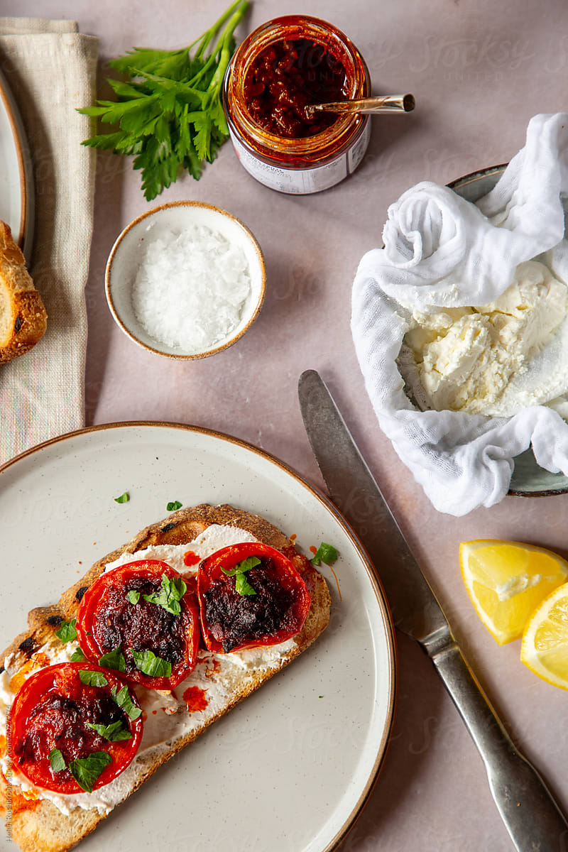 Fresh labneh, roasted spiced tomatoes and sourdough toast.