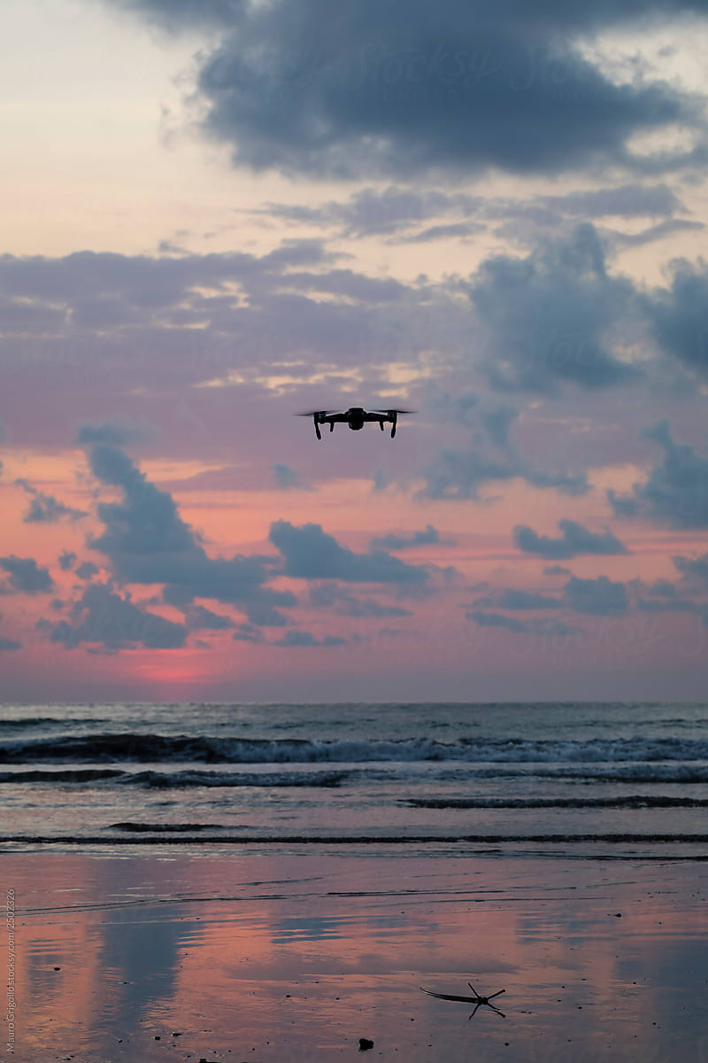 Drone at the beach at sunset
