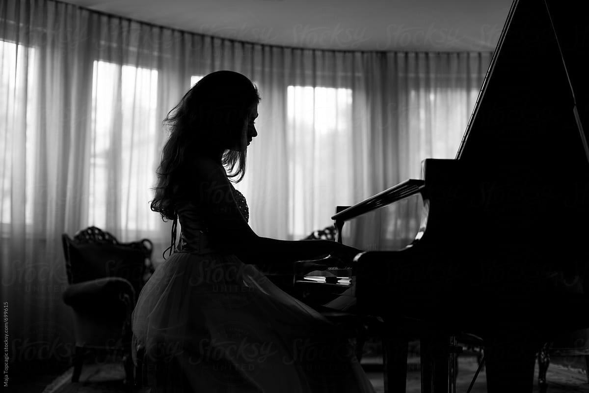 Young, beautiful and talented piano player Naomi