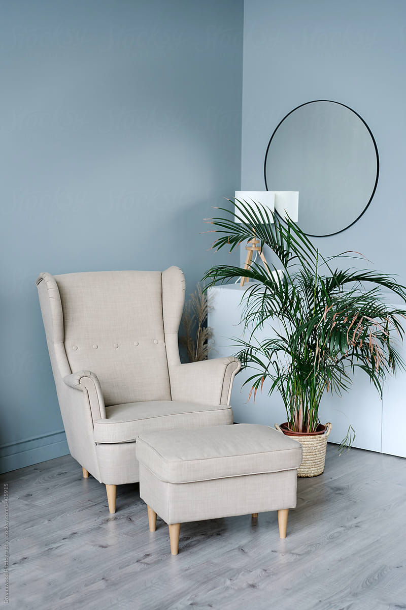 Minimal interior with armchair in corner