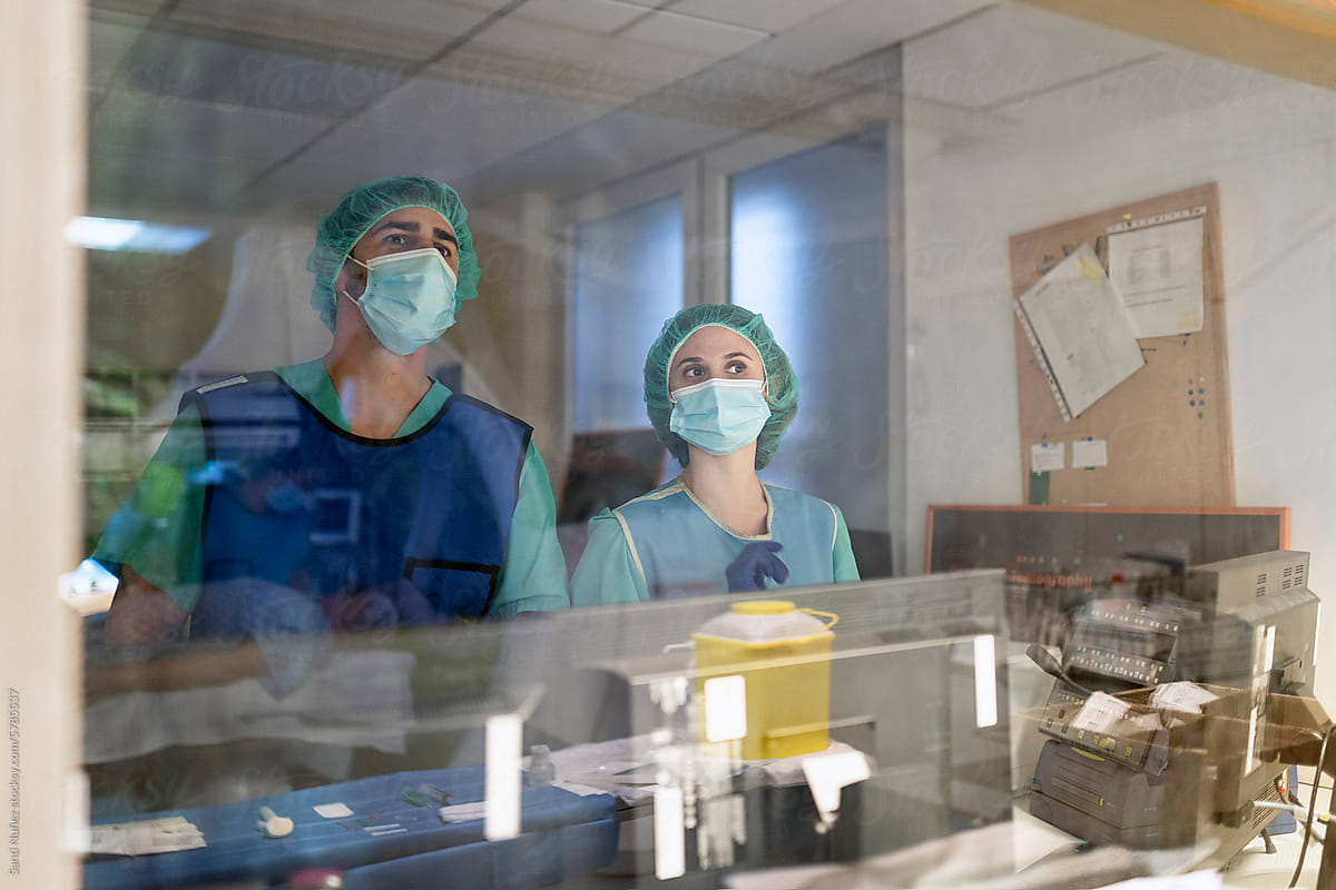 Portrait of surgeons in a medical mask during operation
