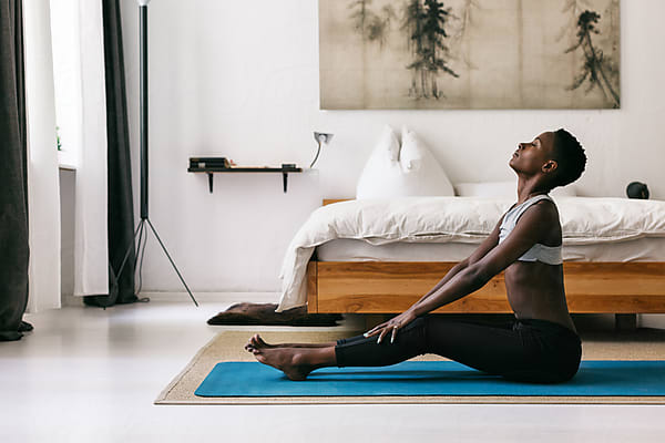 Side View Photo of a Slim African Girl in Sportswear Who Doing Yoga  Exercises on Yoga Mat, Looking at the Camera Stock Image - Image of girl,  healthy: 175970221
