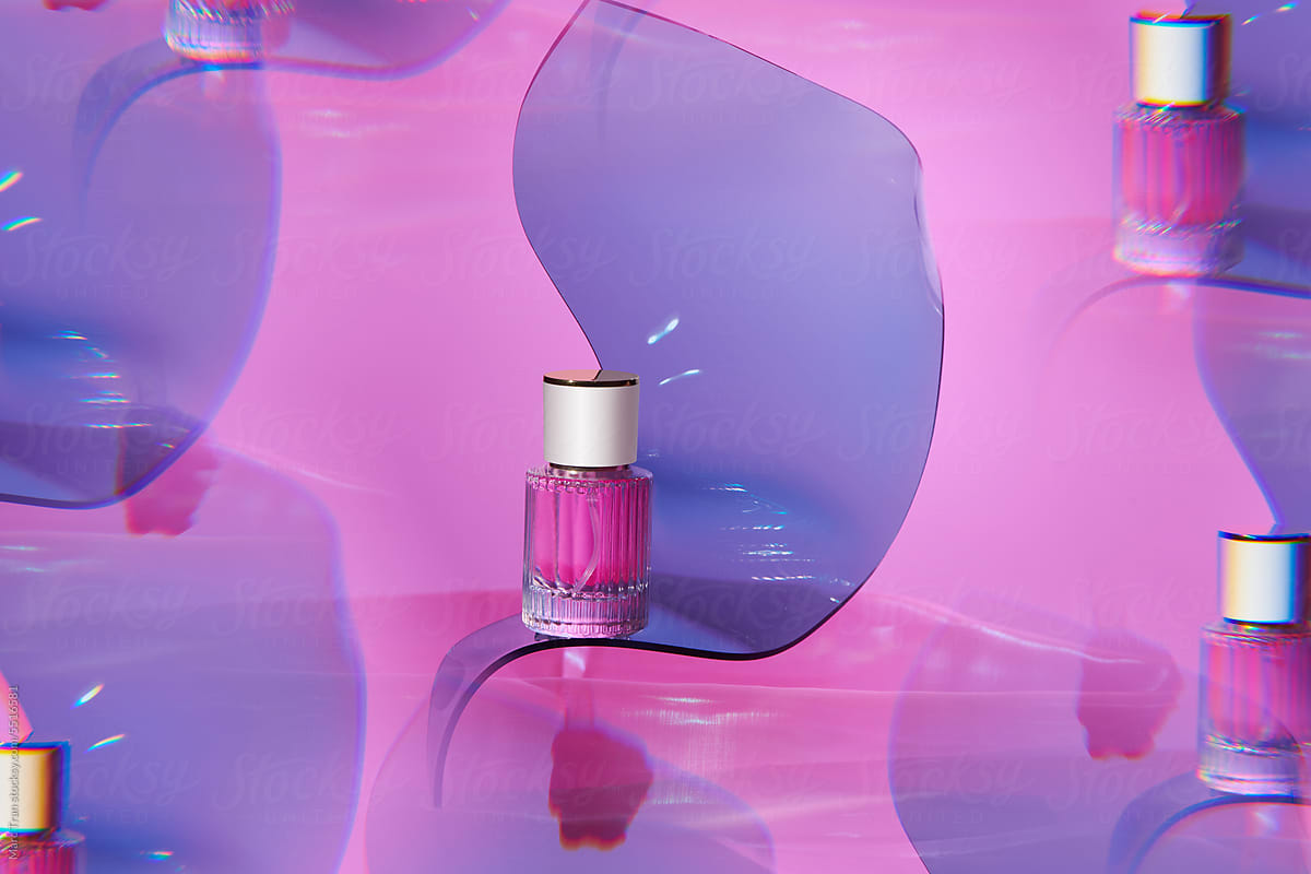 Transparent bottle of perfume presentation with daylight