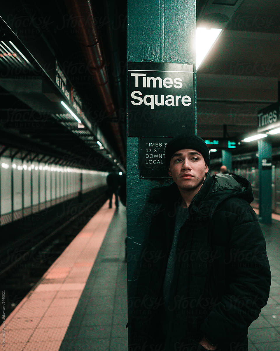 Young Man Waiting for Next Subway