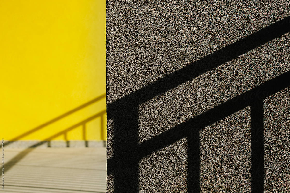 Abstract shadows on yellow wall