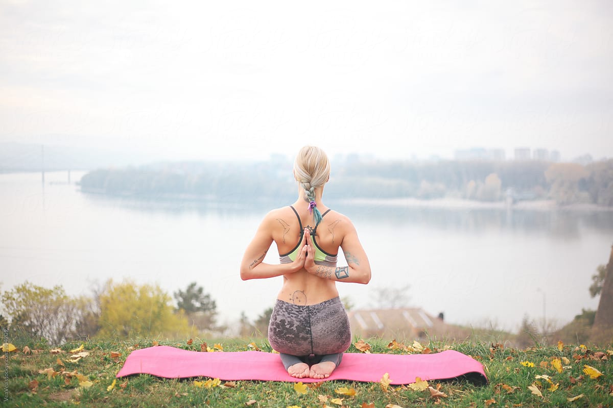Woman doing yoga outdoors
