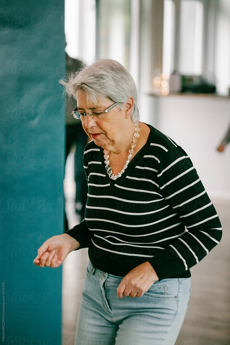 Older Woman Enjoying Herself During Dance Class