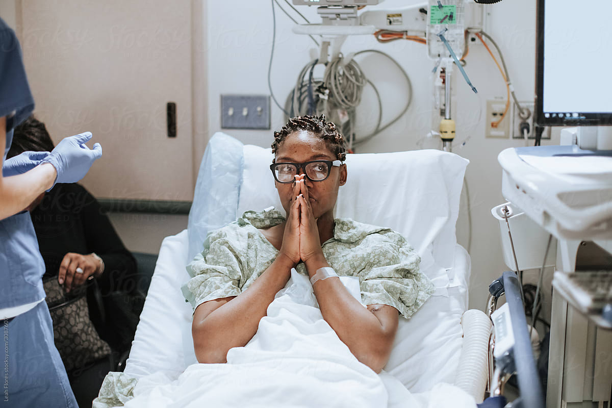 Stressed Woman in Hospital Bed before Surgery