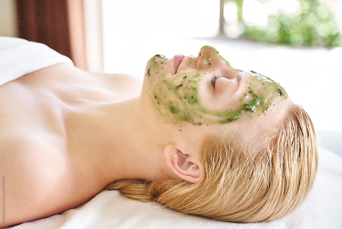 Woman receiving all natural facial at luxury spa