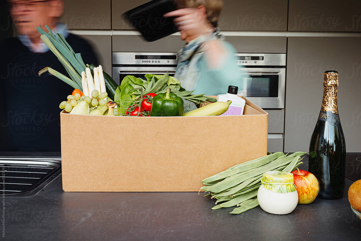 Healthy groceries in a cardboard box