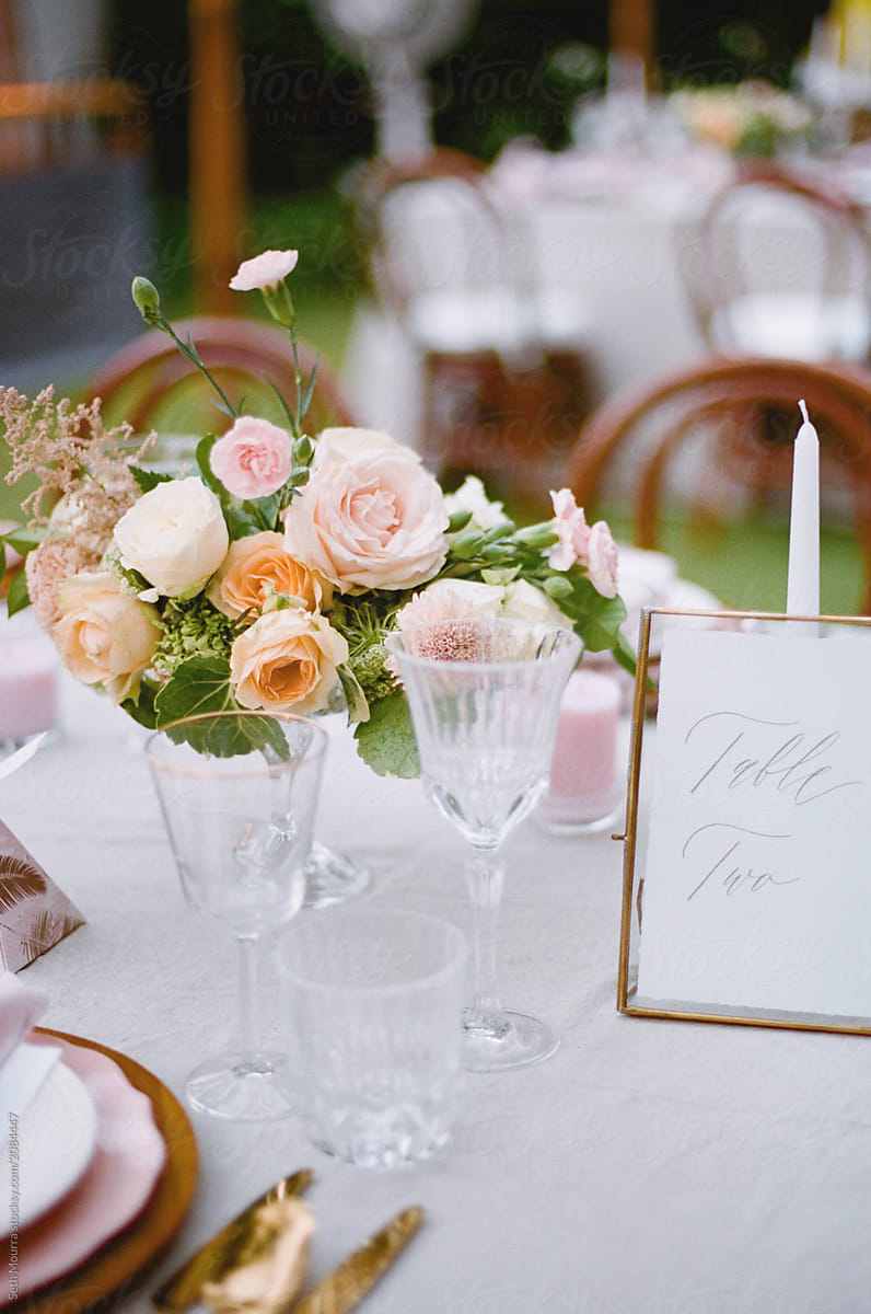 Elegant Outdoor wedding tabletop with florals