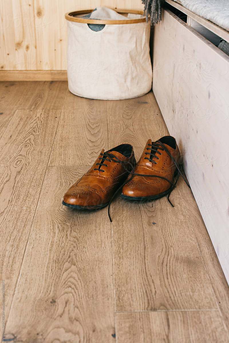 Male Leather Dress Shoes on Wooden Floor