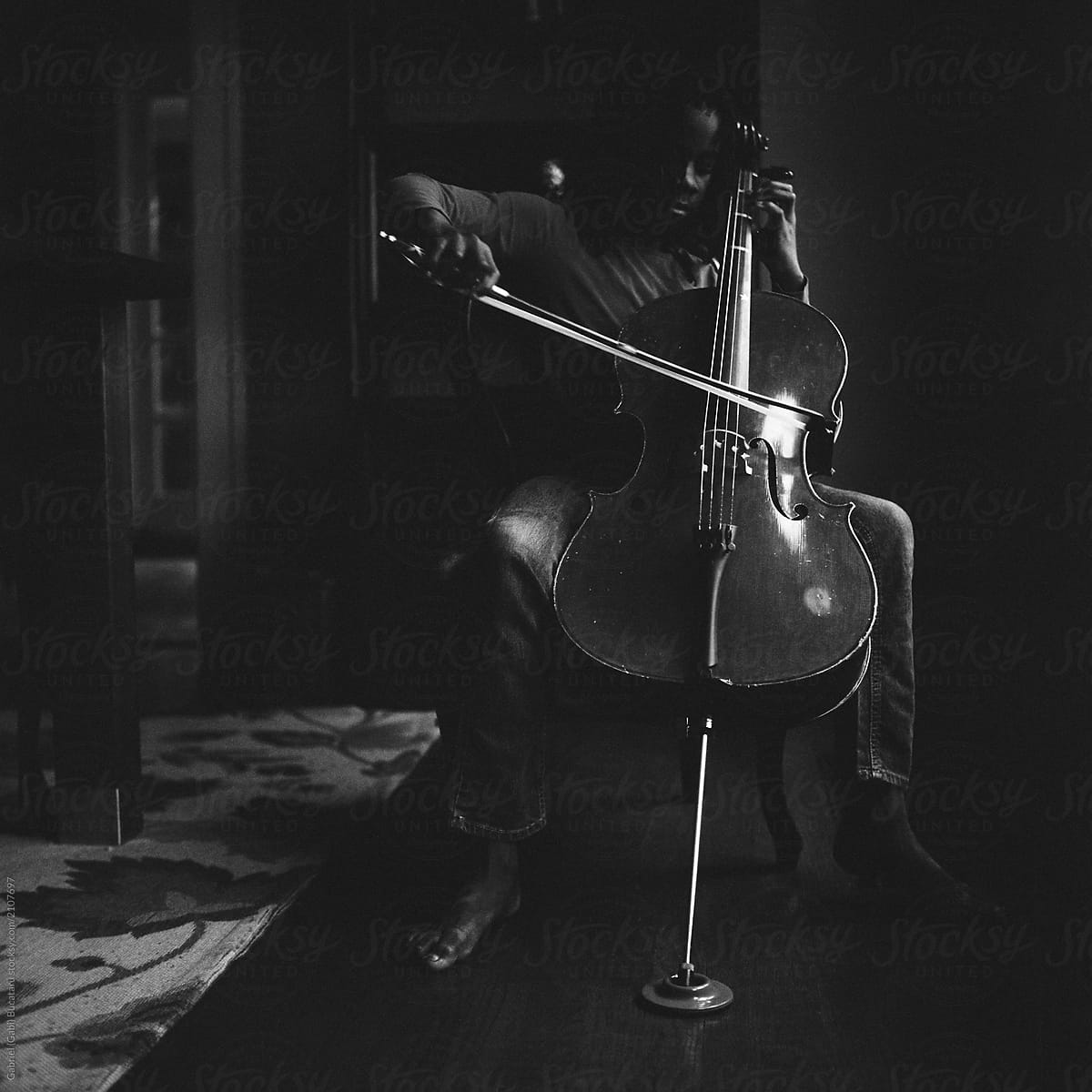 black man with cello