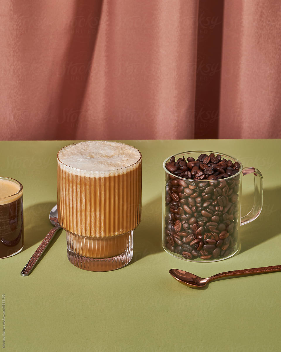 Cappuccino, espresso and coffee beans