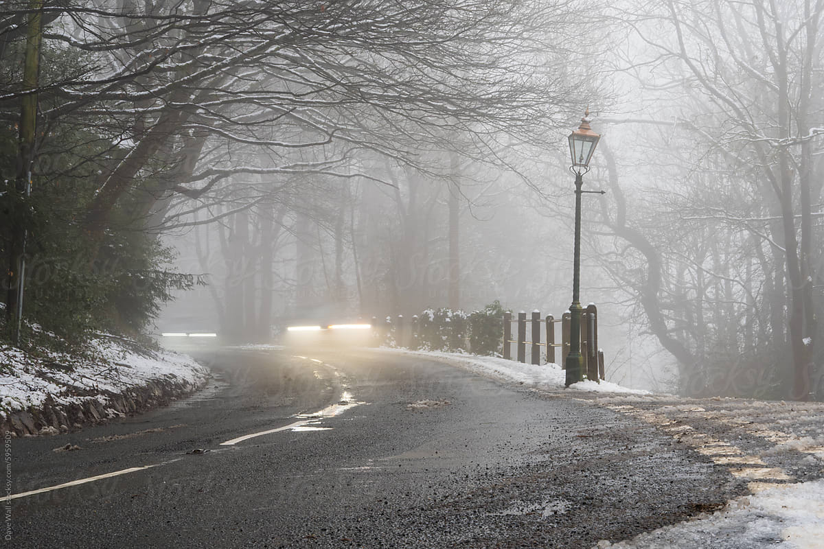 Traffic trails on a foggy winters day
