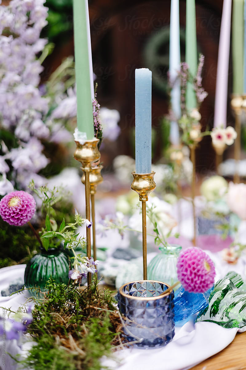 Colorful candles on festive table