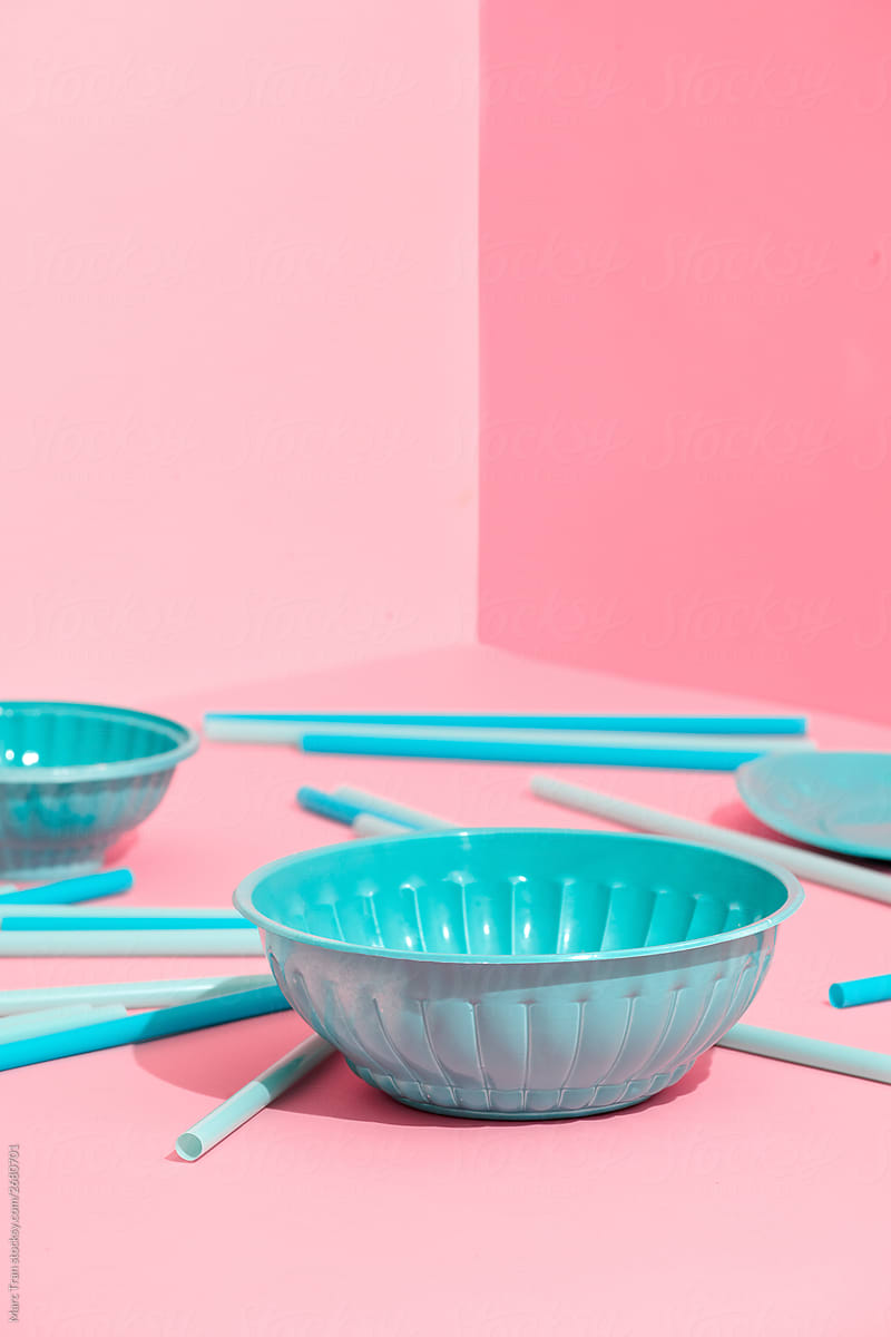 Plastic dishware isolated on pink
